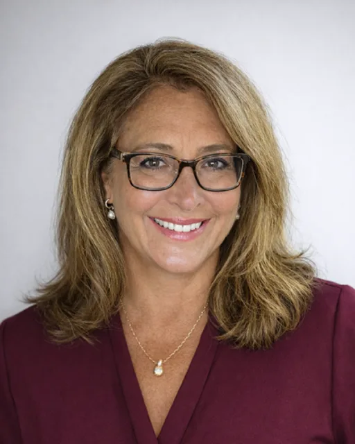 Professional headshot of Megan Donahue, RE/MAX Eagle Realty